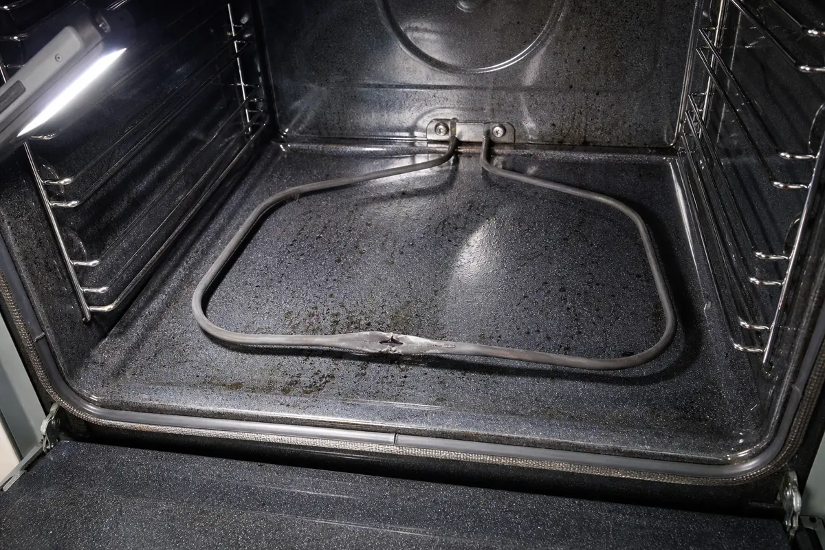 LG oven bake element with visible damage after the oven accepts Bake but stays cold