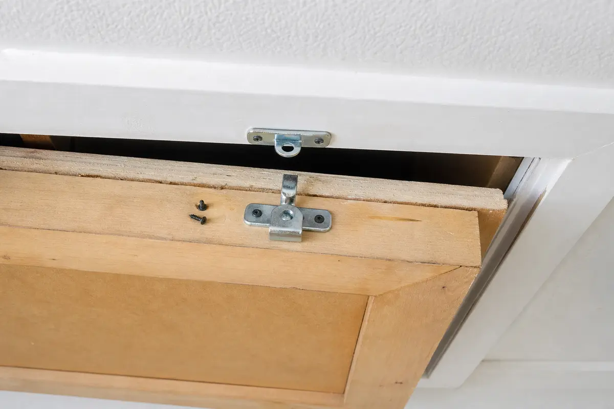 attic hatch latch dry-fit before final fastening or reassembly