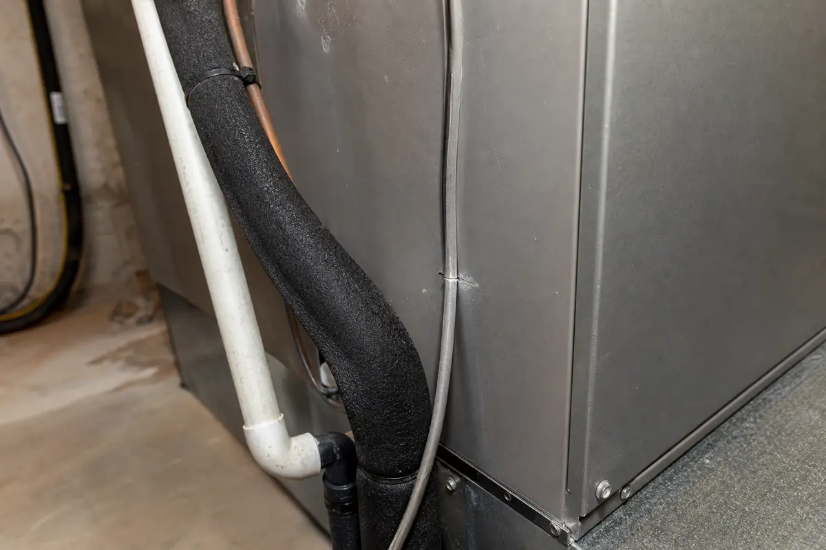 Air handler drain and cabinet side checked for buzzing with water clues