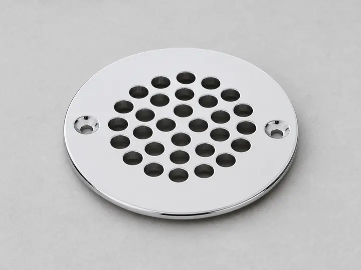 Chrome bathtub drain cover with screw holes