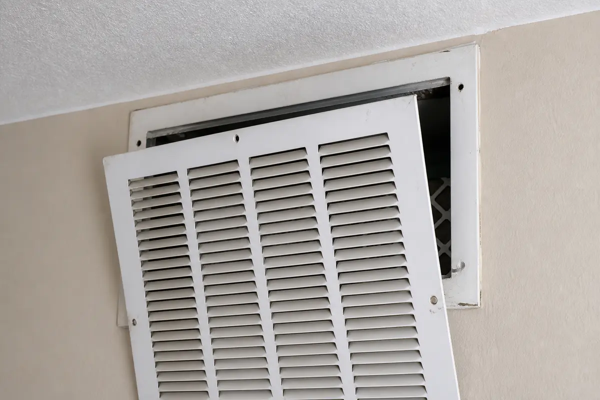 Metal return air grille for replacing a buzzing vent cover