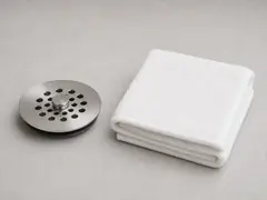 Old towel or drain cover tool