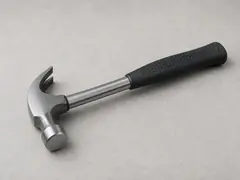 Hammer handle or similar solid tapping tool tool