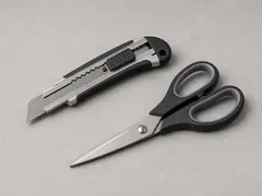 Utility knife or scissors tool
