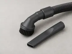 Vacuum with hose attachment tool